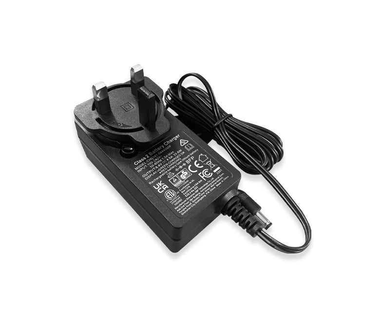 Black power adapter with UK plug